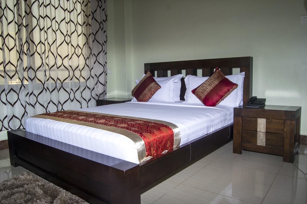 Flomi Hotel Morogoro Szoba fotó